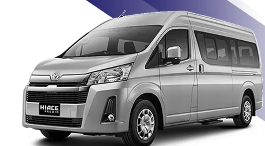 Hiace Premio abu-abu untuk layanan rental mobil di Depok